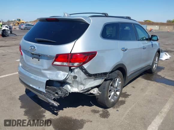 2018 Hyundai Santa Fe SE z VIN KM8SM4HFXJU261140, wystawiony jako IAAI lot #43258957 z przebiegiem 98 636 mil mil oraz . Historia ofert i sprzedaży dostępna na DreamBid. Obrazek 6.