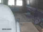 2004 Ford Econoline Cargo with VIN 1FTNE24L64HA94495, listed as a IAAI auction lot 42294791 with 139,453 mi miles and . Bid and sale history available at DreamBid. Image 8.