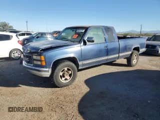 1994 GMC Sierra 1500 with VIN 1GTGC29N2RE545374, listed as a Copart auction lot 90142195 with 149,937 mi miles and Salvage title. Bid and sale history available at DreamBid. Image 1.