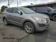 2014 Hyundai Santa Fe z VIN 5XYZT3LB1EG149273, wystawiony jako Copart lot #83761825 z przebiegiem 50 559 mil mil oraz Szkoda całkowita • Salvage title. Historia ofert i sprzedaży dostępna na DreamBid. Obrazek 4.