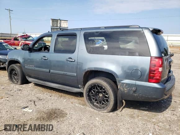 2009 Chevrolet Suburban 2LT с VIN 1GNFC26J19R180232, выставлен на аукционе Copart как лот 63379485 с пробегом Не указан миль и Списание • Salvage title. История ставок и продаж доступна на DreamBid. Изображение 2.