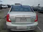 2011 Hyundai Accent GLS with VIN KMHCN4AC7BU607485, listed as a Copart auction lot 81957435 with 141,057 mi miles and Salvage title. Bid and sale history available at DreamBid. Image 6.