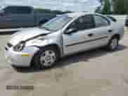 2003 Dodge Neon SE with VIN 1B3ES26C23D261772, listed as a Copart auction lot 70193335 with 181,827 mi miles and Salvage title. Bid and sale history available at DreamBid. Image 1.
