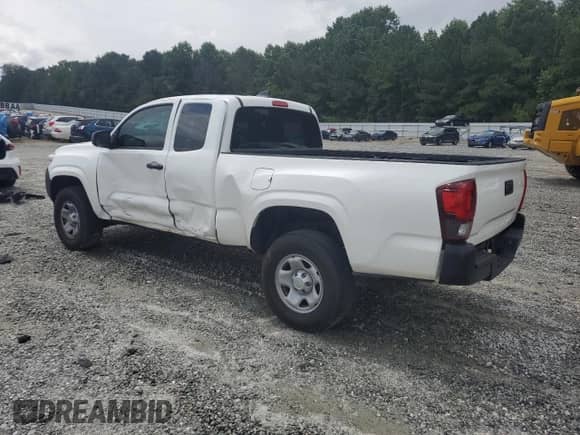 2023 Toyota Tacoma SR z VIN 3TYRX5GN2PT085100, wystawiony jako Copart lot #70010035 z przebiegiem 48 446 mil mil oraz Szkoda całkowita • Salvage title. Historia ofert i sprzedaży dostępna na DreamBid. Obrazek 2.
