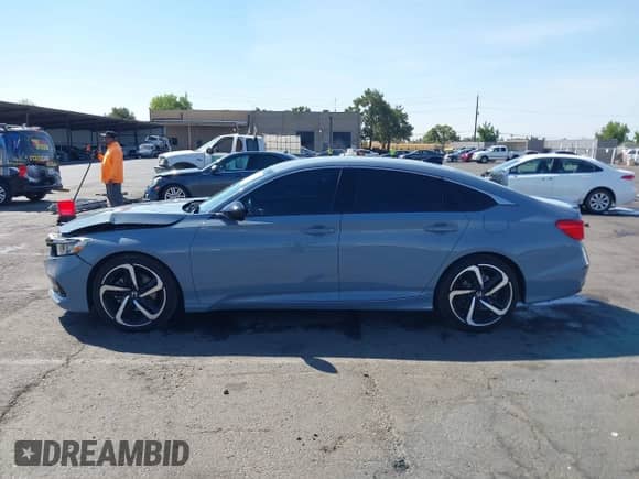 2022 Honda Accord Sport with VIN 1HGCV3F23NA041766, listed as a IAAI auction lot 43133626 with 52,891 mi miles and . Bid and sale history available at DreamBid. Image 14.