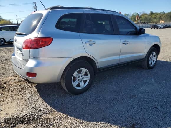 2009 Hyundai Santa Fe GLS with VIN 5NMSG73D39H259669, listed as a Copart auction lot 81992325 with 183,559 mi miles and Clean title. Bid and sale history available at DreamBid. Image 3.