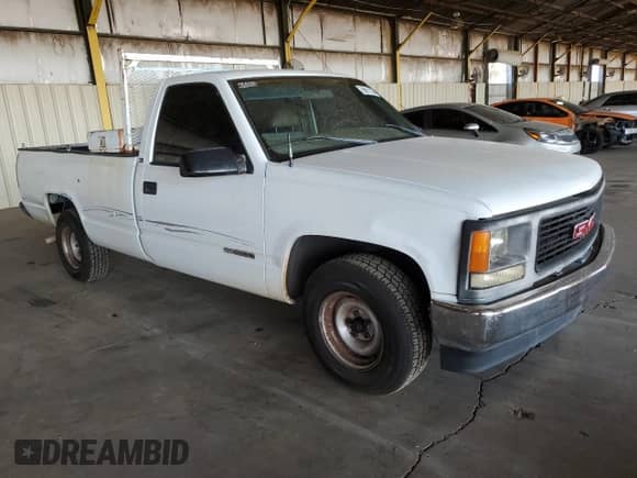 1998 GMC Sierra 1500 z VIN 1GTEC14M6WZ850008, wystawiony jako Copart lot #68911324 z przebiegiem 110 409 mil mil oraz Szkoda całkowita • Salvage title. Historia ofert i sprzedaży dostępna na DreamBid. Obrazek 4.