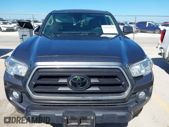 2021 Toyota Tacoma SR5 with VIN 5TFAZ5CN0MX106119, listed as a IAAI auction lot 42812735 with 70,968 mi miles and . Bid and sale history available at DreamBid. Image 12.