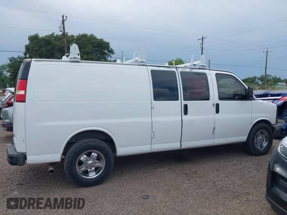 2014 Chevrolet Express Cargo with VIN 1GCWGGBA8E1122630, listed as a IAAI auction lot 42695749 with 208,291 mi miles and . Bid and sale history available at DreamBid. Image 13.