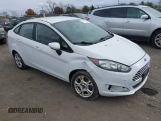 2015 Ford Fiesta SE z VIN 3FADP4BJ8FM126161, wystawiony jako IAAI lot #43568274 z przebiegiem 138 715 mil mil oraz . Historia ofert i sprzedaży dostępna na DreamBid. Obrazek 1.