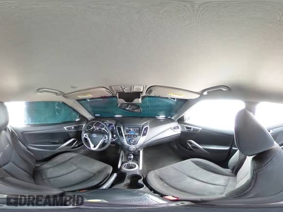 2014 Hyundai Veloster z VIN KMHTC6AD8EU194443, wystawiony jako Copart lot #60059565 z przebiegiem 201 848 mil mil oraz Szkoda całkowita • Salvage title. Historia ofert i sprzedaży dostępna na DreamBid. Obrazek 13.