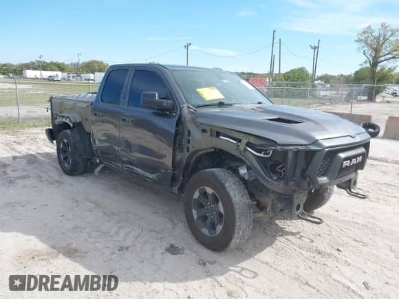 2020 Ram 1500 Rebel with VIN 1C6SRFETXLN258352, listed as a IAAI auction lot 41739065 with 199,624 mi miles and . Bid and sale history available at DreamBid. Image 1.