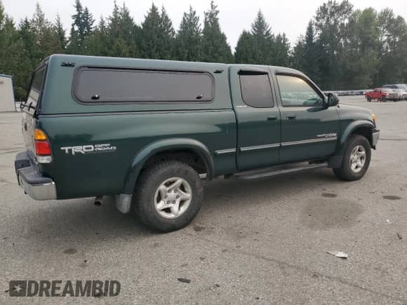 2001 Toyota Tundra Limited z VIN 5TBBT48171S143054, wystawiony jako Copart lot #71740305 z przebiegiem 121 330 mil mil oraz Czysty tytuł • Clean title. Historia ofert i sprzedaży dostępna na DreamBid. Obrazek 3.