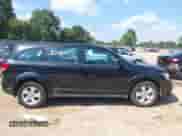 2013 Dodge Journey American Value z VIN 3C4PDCAB1DT665342, wystawiony jako IAAI lot #43204169 z przebiegiem 165 036 mil mil oraz . Historia ofert i sprzedaży dostępna na DreamBid. Obrazek 13.