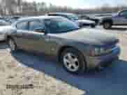 2010 Dodge Charger 3.5L with VIN 2B3CA2CVXAH251104, listed as a Copart auction lot 44180915 with 133,407 mi miles and Salvage title. Bid and sale history available at DreamBid. Image 4.
