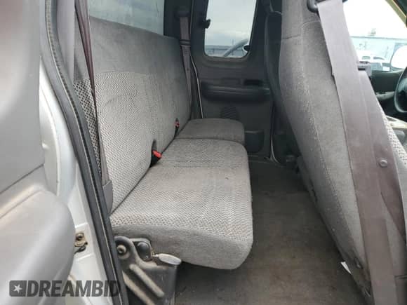 2000 Ford F-150 XL with VIN 1FTRX18W3YNB81000, listed as a Copart auction lot 86476645 with 210,299 mi miles and Salvage title. Bid and sale history available at DreamBid. Image 10.