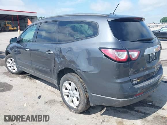 2014 Chevrolet Traverse LS z VIN 1GNKVFED8EJ309426, wystawiony jako IAAI lot #42571126 z przebiegiem 225 400 mil mil oraz . Historia ofert i sprzedaży dostępna na DreamBid. Obrazek 3.