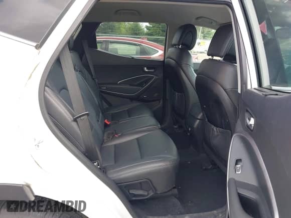 2014 Hyundai Santa Fe with VIN 5XYZU3LA9EG200085, listed as a IAAI auction lot 43003393 with 90,660 mi miles and . Bid and sale history available at DreamBid. Image 8.