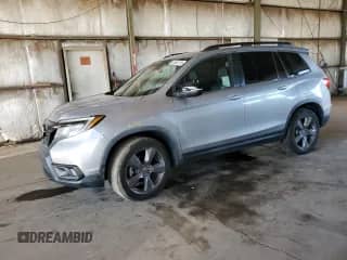 2019 Honda Passport Touring with VIN 5FNYF7H91KB008724, listed as a Copart auction lot 80562725 with 71,737 mi miles and Salvage title. Bid and sale history available at DreamBid. Image 1.