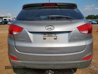 2013 Hyundai Tucson Limited z VIN KM8JU3AC6DU675655, wystawiony jako Copart lot #70305515 z przebiegiem 179 737 mil mil oraz Szkoda całkowita • Salvage title. Historia ofert i sprzedaży dostępna na DreamBid. Obrazek 6.