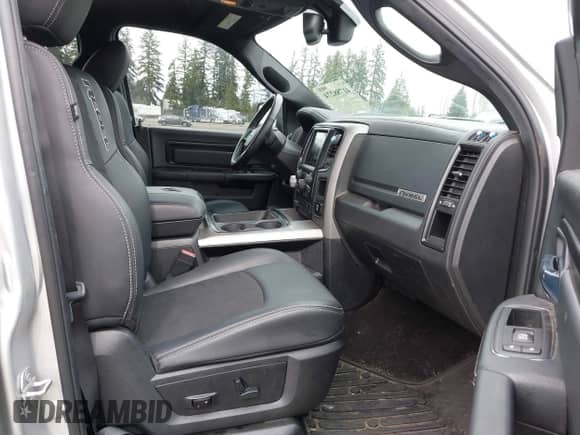 2018 Ram 1500 Rebel with VIN 1C6RR7YT5JS152633, listed as a IAAI auction lot 41788274 with 146,298 mi miles and . Bid and sale history available at DreamBid. Image 5.