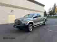 2012 Dodge RAM with VIN 3C63D3ML2CG290319, listed as a Copart auction lot 89928905 with 264,682 mi miles and Salvage title. Bid and sale history available at DreamBid. Image 2.