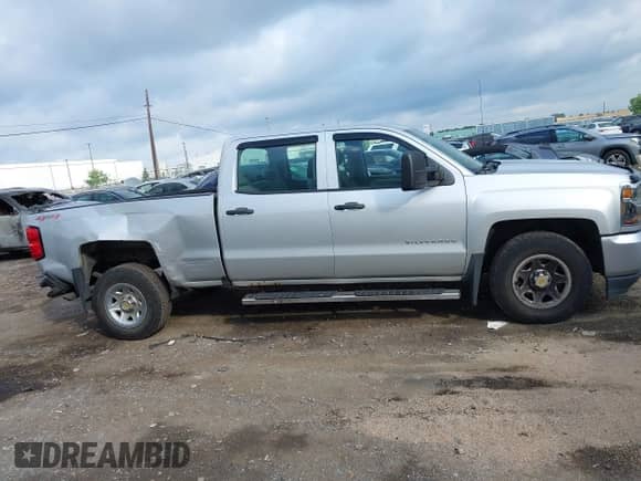 2017 Chevrolet Silverado 1500 Work Truck z VIN 3GCUKNEC8HG515623, wystawiony jako IAAI lot #42752210 z przebiegiem 166 066 mil mil oraz . Historia ofert i sprzedaży dostępna na DreamBid. Obrazek 13.