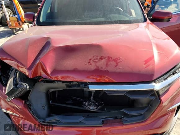 2024 Honda Pilot EX-L with VIN 5FNYG1H56RB025469, listed as a Copart auction lot 85899674 with 13,877 mi miles and Salvage title. Bid and sale history available at DreamBid. Image 12.