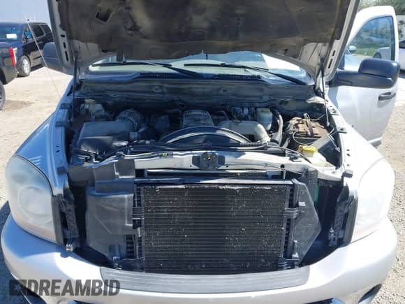 2006 Dodge 2500 ST z VIN 1D7KS28C26J223534, wystawiony jako IAAI lot #42642338 z przebiegiem 137 742 mil mil oraz . Historia ofert i sprzedaży dostępna na DreamBid. Obrazek 10.