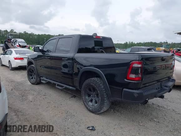 2020 Ram 1500 Rebel z VIN 1C6SRFLT7LN196248, wystawiony jako IAAI lot #42221745 z przebiegiem 40 860 mil mil oraz . Historia ofert i sprzedaży dostępna na DreamBid. Obrazek 3.