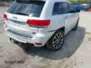 2018 Jeep Grand Cherokee Overland with VIN 1C4RJFCT4JC431275, listed as a IAAI auction lot 41931665 with 99,097 mi miles and . Bid and sale history available at DreamBid. Image 6.