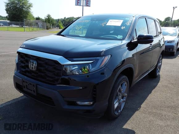 2023 Honda Passport EX-L with VIN 5FNYF8H51PB009494, listed as a IAAI auction lot 42751895 with 24,085 mi miles and . Bid and sale history available at DreamBid. Image 2.