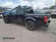 2010 Nissan Frontier Pro-4X with VIN 1N6AD0EV7AC417173, listed as a Copart auction lot 65851905 with 184,667 mi miles and Clean title. Bid and sale history available at DreamBid. Image 2.