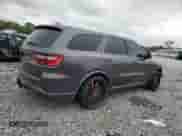 2015 Dodge Durango R/T with VIN 1C4SDJCT7FC223555, listed as a Copart auction lot 67484325 with 142,596 mi miles and Salvage title. Bid and sale history available at DreamBid. Image 3.