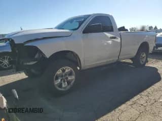 2010 Dodge 1500 ST with VIN 3D7JV1EP8AG112114, listed as a Copart auction lot 74069664 with 14,827 mi miles and Salvage title. Bid and sale history available at DreamBid. Image 1.