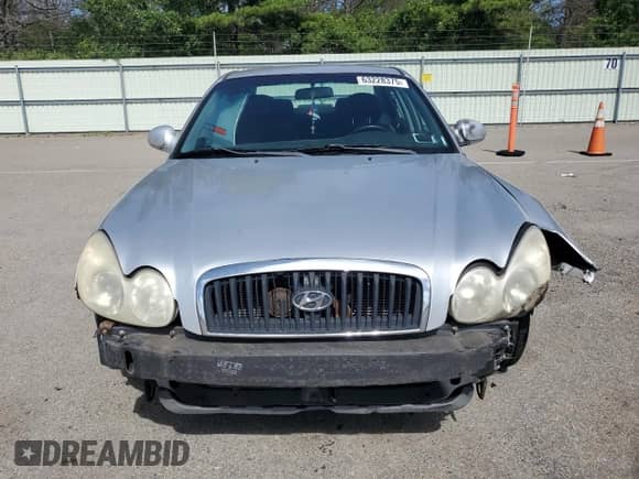 2004 Hyundai Sonata z VIN KMHWF25S44A002313, wystawiony jako Copart lot #63228375 z przebiegiem 165 208 mil mil oraz Szkoda całkowita • Salvage title. Historia ofert i sprzedaży dostępna na DreamBid. Obrazek 5.