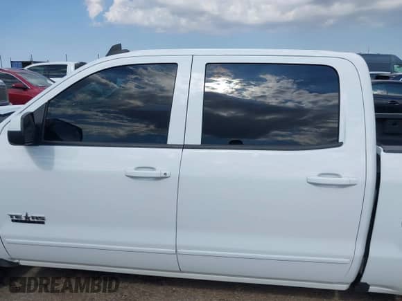 2018 Chevrolet Silverado 1500 LT with VIN 3GCUKREC6JG561917, listed as a IAAI auction lot 42694194 with 111,454 mi miles and . Bid and sale history available at DreamBid. Image 14.