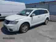 2013 Dodge Journey SXT with VIN 3C4PDCBG2DT619156, listed as a IAAI auction lot 43028682 with 194,375 mi miles and . Bid and sale history available at DreamBid. Image 2.