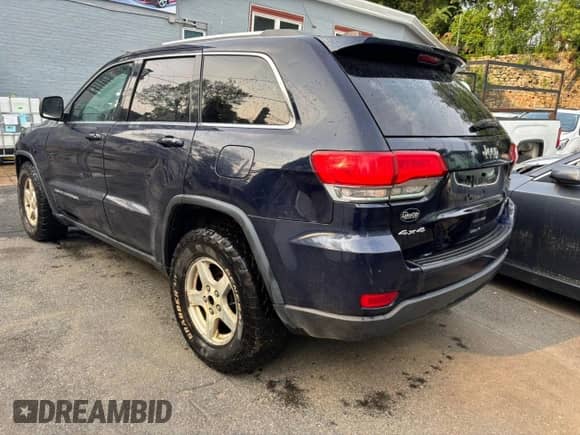 2014 Jeep Grand Cherokee Laredo with VIN 1C4RJFAG0EC109809, listed as a Copart auction lot 68381665 with 251,606 mi miles and Clean title. Bid and sale history available at DreamBid. Image 3.