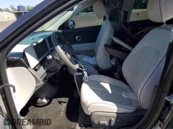 2022 Hyundai Ioniq 5 SEL with VIN KM8KNDAF9NU102588, listed as a Copart auction lot 68158415 with 35,654 mi miles and Salvage title. Bid and sale history available at DreamBid. Image 7.