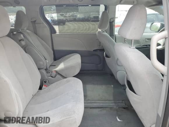 2014 Toyota Sienna LE AAS с VIN 5TDKK3DC3ES470875, выставлен на аукционе Copart как лот 80849645 с пробегом 174 639 миль миль и Списание • Salvage title. История ставок и продаж доступна на DreamBid. Изображение 11.