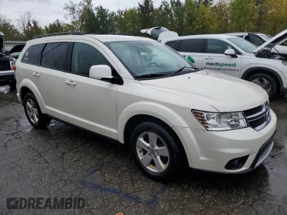 2012 Dodge Journey SXT z VIN 3C4PDDBG1CT315997, wystawiony jako Copart lot #82042085 z przebiegiem 146 413 mil mil oraz Czysty tytuł • Clean title. Historia ofert i sprzedaży dostępna na DreamBid. Obrazek 4.