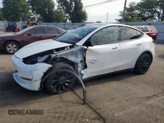 2022 Tesla Model Y Performance with VIN 7SAYGDEF2NF382031, listed as a Copart auction lot 67597225 with 80,276 mi miles and Salvage title. Bid and sale history available at DreamBid. Image 1.