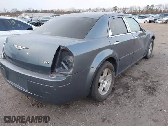 2005 Chrysler 300 300 with VIN 2C3AA43R95H663173, listed as a IAAI auction lot 41361390 with Not provided miles and . Bid and sale history available at DreamBid. Image 4.