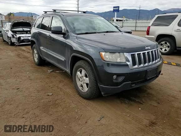 2012 Jeep Grand Cherokee Laredo z VIN 1C4RJFAG5CC202791, wystawiony jako Copart lot #86040175 z przebiegiem 206 265 mil mil oraz Szkoda całkowita • Salvage title. Historia ofert i sprzedaży dostępna na DreamBid. Obrazek 14.