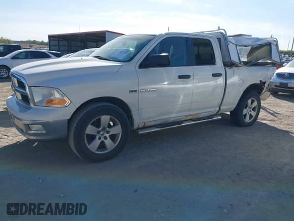 2009 Dodge 1500 SLT with VIN 1D3HV18T09S735028, listed as a IAAI auction lot 43522338 with 226,509 mi miles and . Bid and sale history available at DreamBid. Image 2.