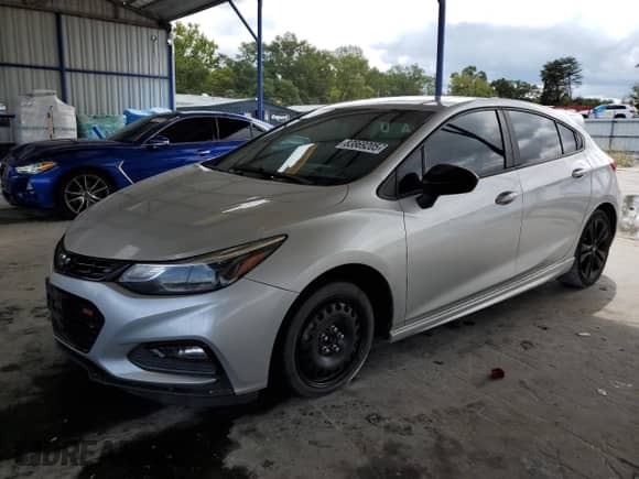 2018 Chevrolet Cruze LT с VIN 3G1BE6SM9JS582924, выставлен на аукционе Copart как лот 83869205 с пробегом 171 250 миль миль и Списание • Salvage title. История ставок и продаж доступна на DreamBid. Изображение 1.