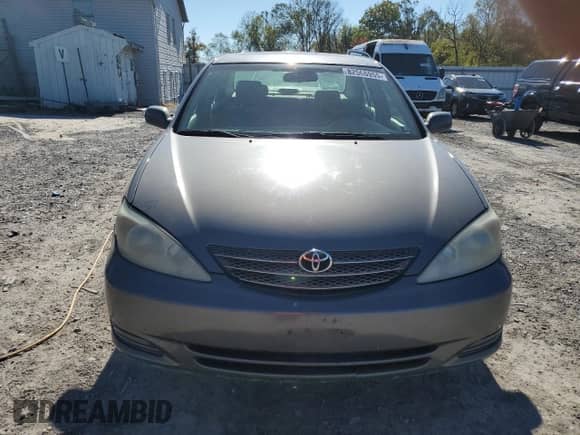 2004 Toyota Camry LE with VIN 4T1BE30KX4U939793, listed as a Copart auction lot 82566955 with 279,475 mi miles and Clean title. Bid and sale history available at DreamBid. Image 5.