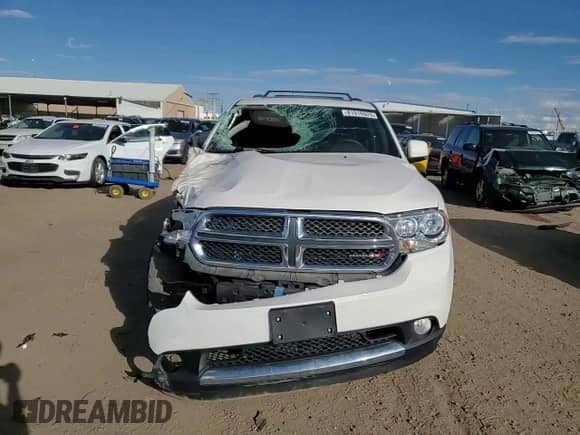 2012 Dodge Durango Crew z VIN 1C4RDJDG3CC242079, wystawiony jako Copart lot #81916925 z przebiegiem 154 935 mil mil oraz Szkoda całkowita • Salvage title. Historia ofert i sprzedaży dostępna na DreamBid. Obrazek 14.