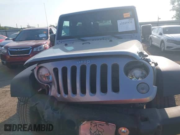 2016 Jeep Wrangler Sport with VIN 1C4AJWAG1GL198614, listed as a IAAI auction lot 43241931 with 84,715 mi miles and . Bid and sale history available at DreamBid. Image 12.
